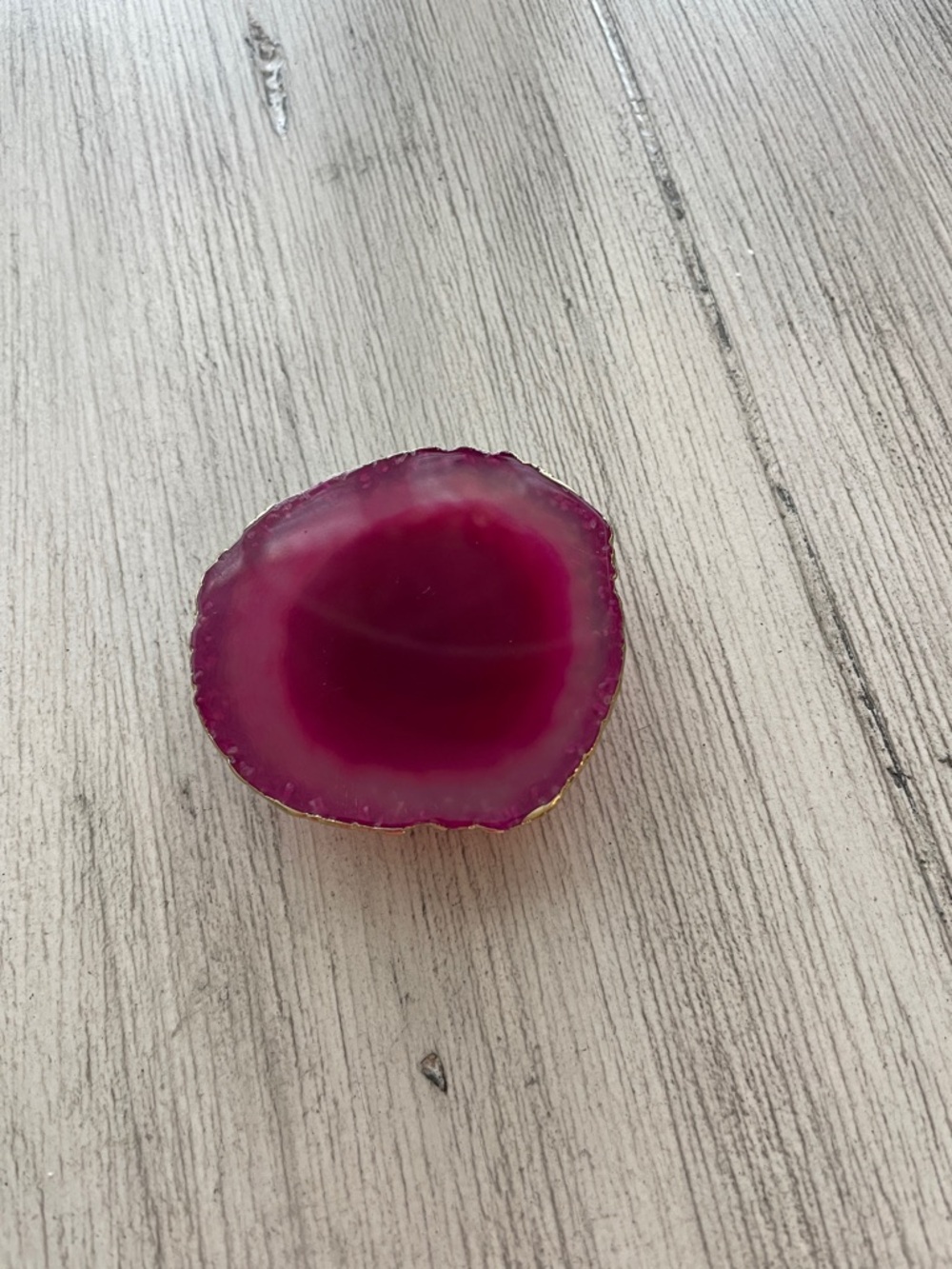 Raspberry colored Stone Cell phone grip.